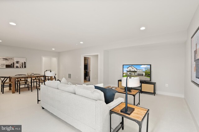 5817 2nd St S, Arlington, VA 22204 - living room with light colored carpet, recessed lighting, and baseboards