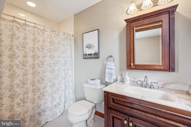 bathroom with tile patterned flooring, curtained shower, vanity, and toilet