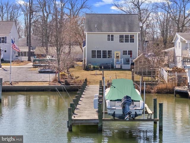 view of dock featuring a water view and boat lift