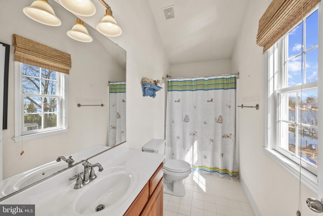 full bath featuring visible vents, toilet, vanity, baseboards, and tile patterned floors