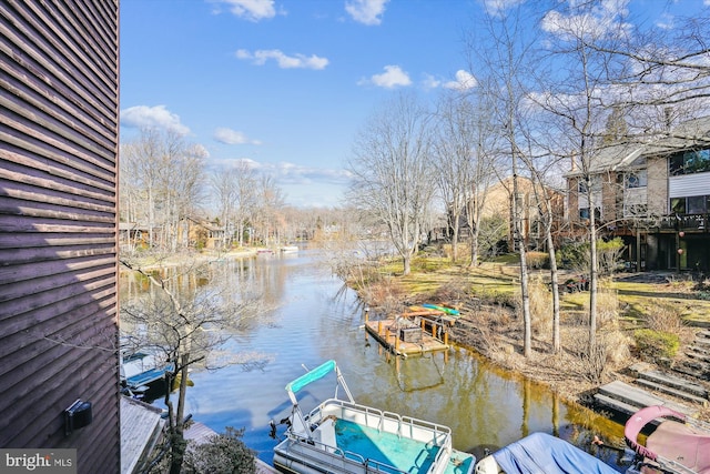 view of dock with a water view