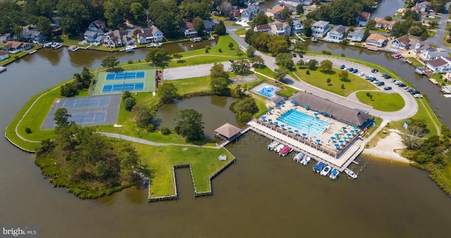 bird's eye view with a water view and a residential view