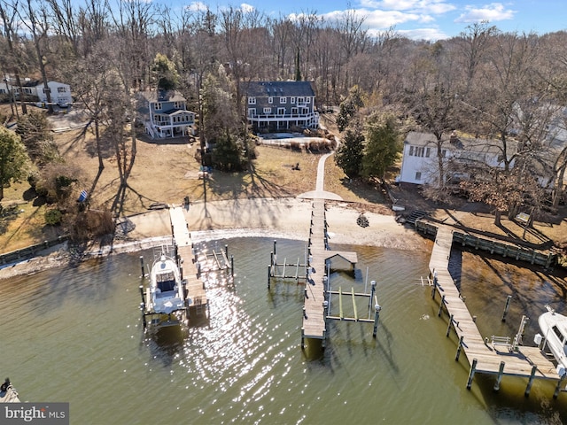 view of dock featuring a water view and boat lift