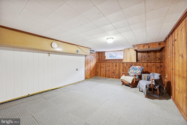 unfurnished room with carpet floors and visible vents