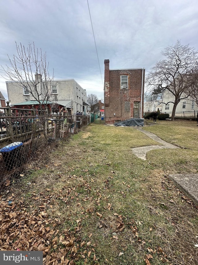 view of yard with fence