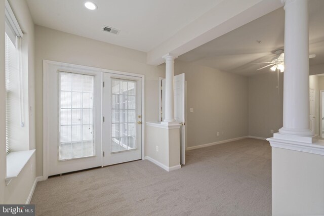 interior space featuring decorative columns, visible vents, baseboards, a ceiling fan, and recessed lighting