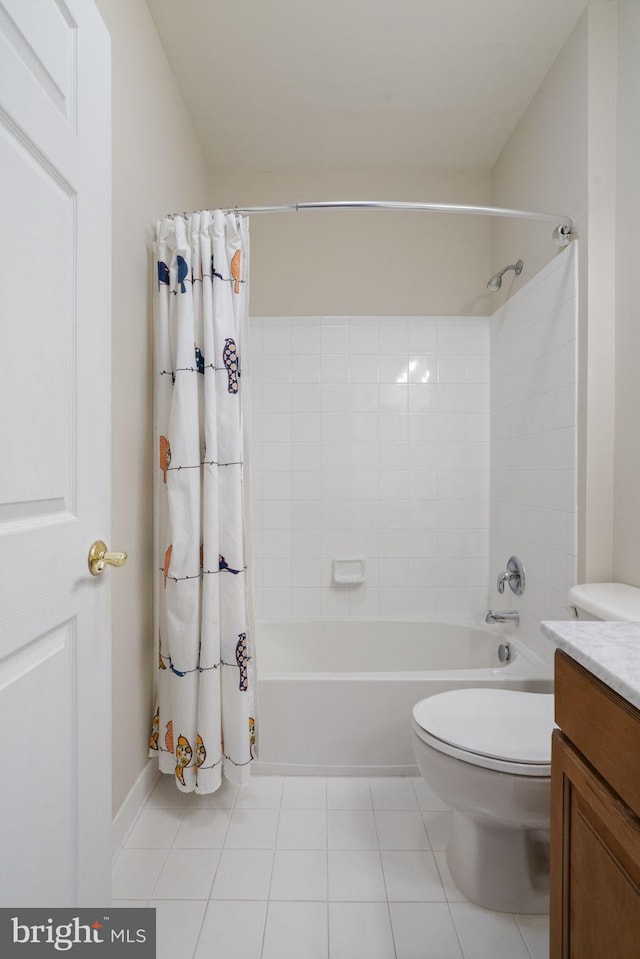 bathroom with vanity, shower / bathtub combination with curtain, toilet, and tile patterned floors