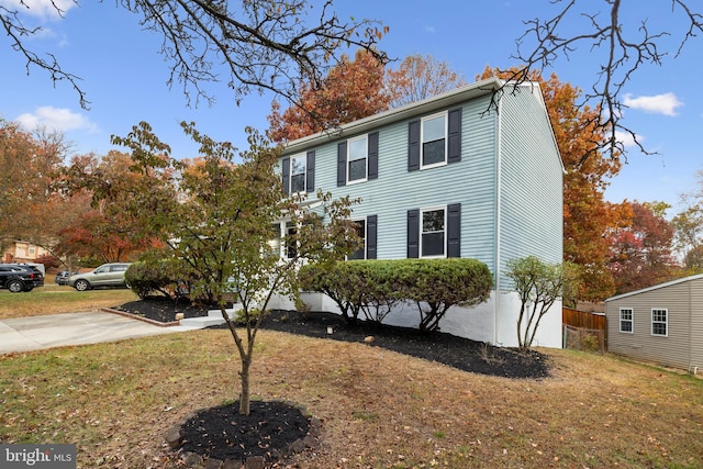 view of front of home with a front yard