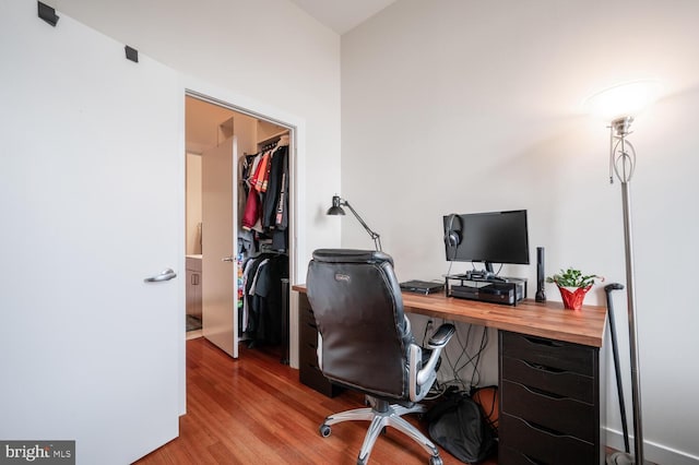 office area with light wood-style floors