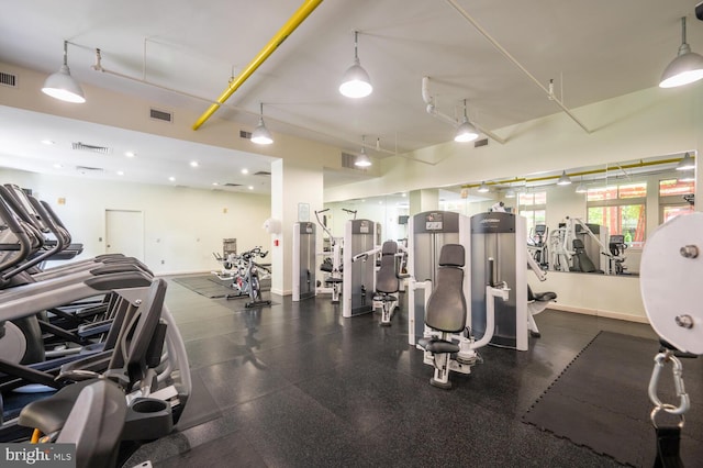 workout area featuring visible vents and baseboards