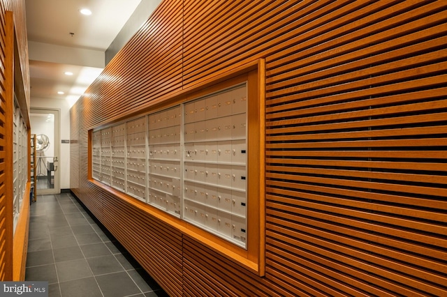 view of home's community featuring mail area