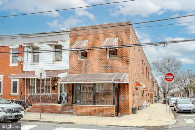 multi unit property featuring brick siding