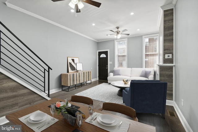 living room featuring baseboards, ornamental molding, dark wood-style flooring, stairs, and recessed lighting