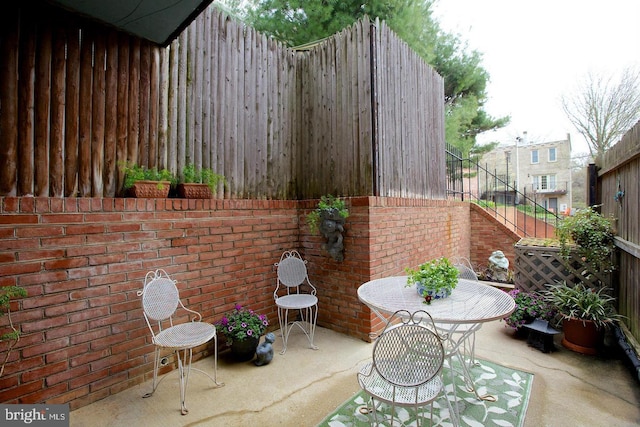 view of patio featuring stairway