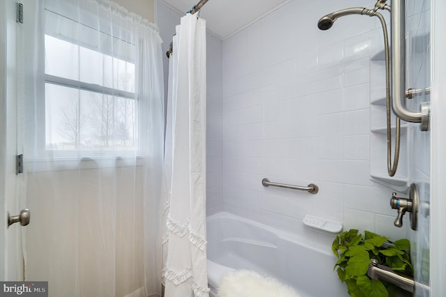 full bathroom featuring shower / bathtub combination with curtain