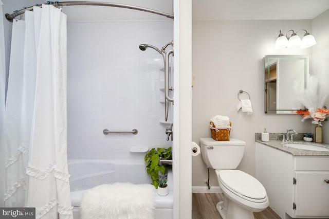 full bath with shower / bathtub combination with curtain, toilet, vanity, wood finished floors, and baseboards