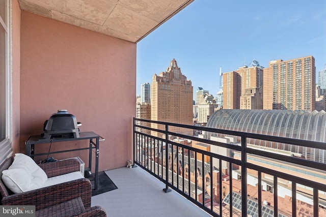 balcony featuring a view of city