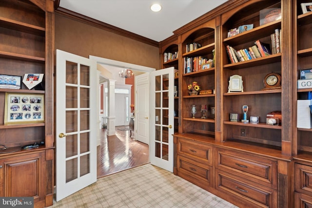 office area with french doors, crown molding, and decorative columns