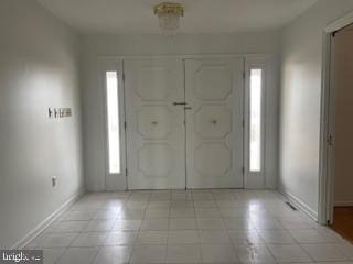 foyer entrance with plenty of natural light