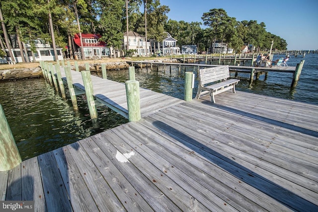 dock area featuring a water view