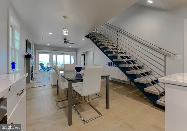 dining area with stairway, recessed lighting, and light wood-style flooring