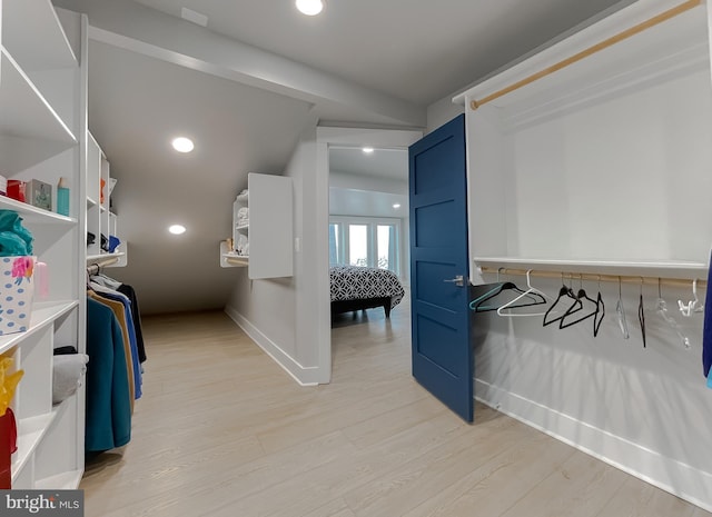 spacious closet with light wood finished floors