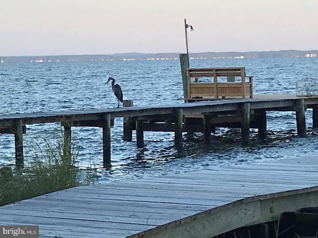 view of dock with a water view