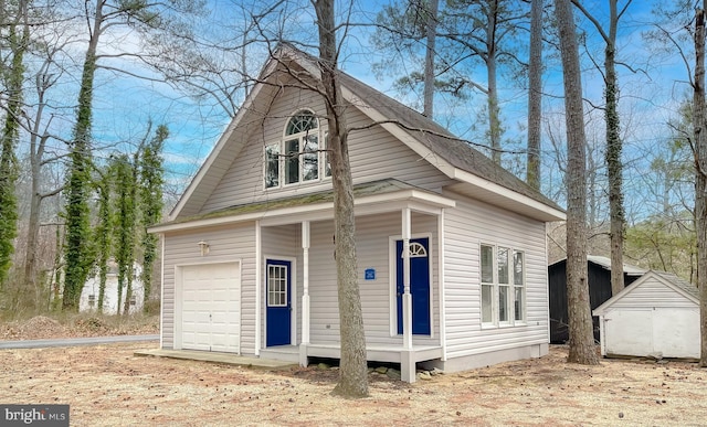 view of home's exterior with an outbuilding