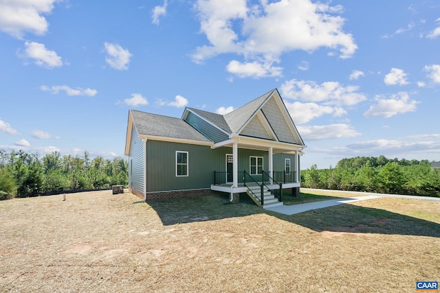 view of front of property featuring covered porch