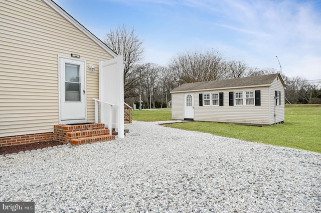 exterior space featuring entry steps and driveway