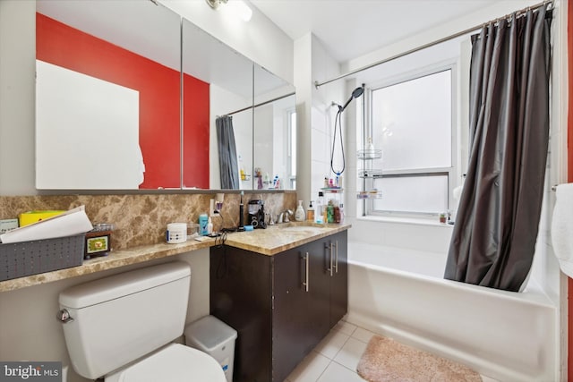 bathroom featuring toilet, vanity, backsplash, tile patterned floors, and shower / bath combination with curtain