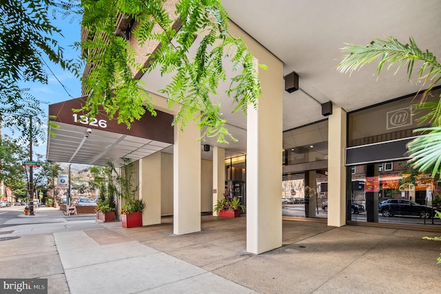 property entrance featuring stucco siding