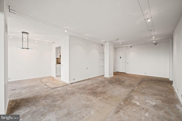 garage with baseboards