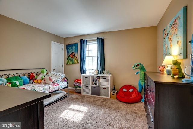 bedroom with light colored carpet