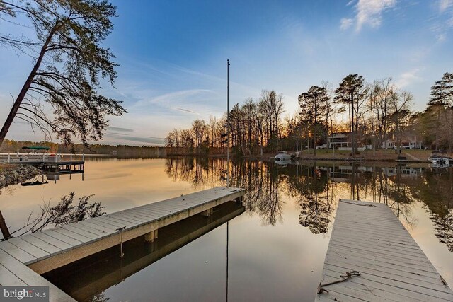 view of dock with a water view