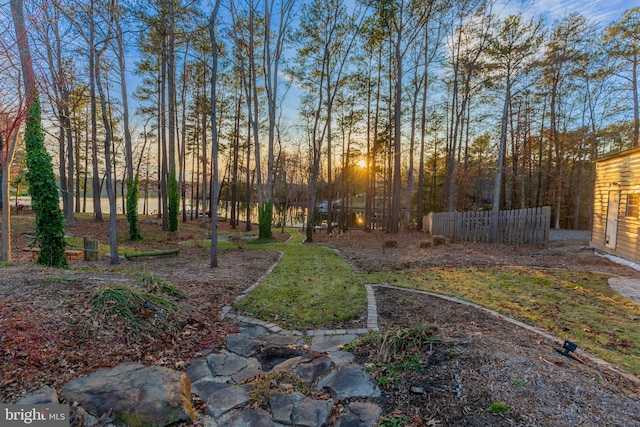 yard at dusk with fence