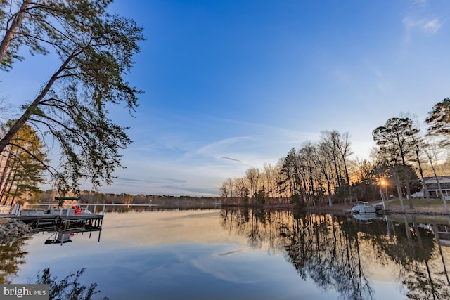 view of water feature with a dock