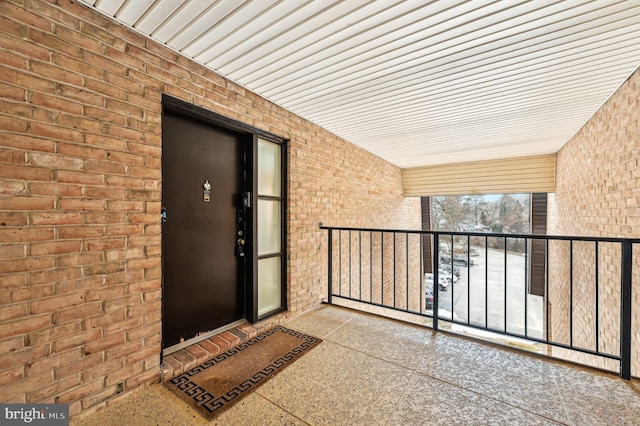 doorway to property with a balcony