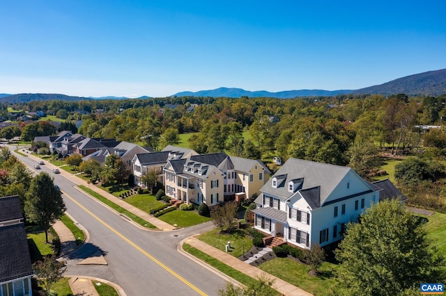 birds eye view of property with a residential view and a mountain view