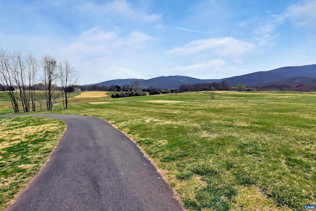 property view of mountains featuring a rural view