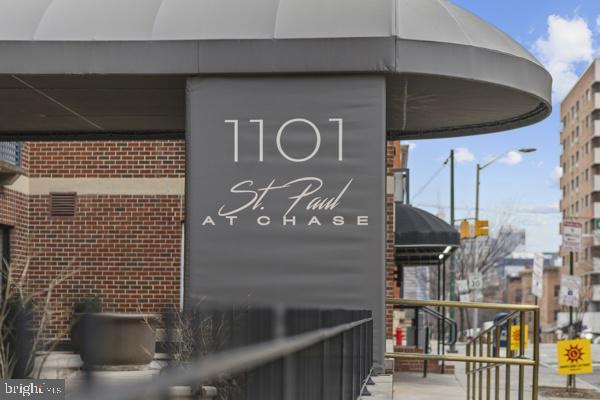 exterior details featuring brick siding