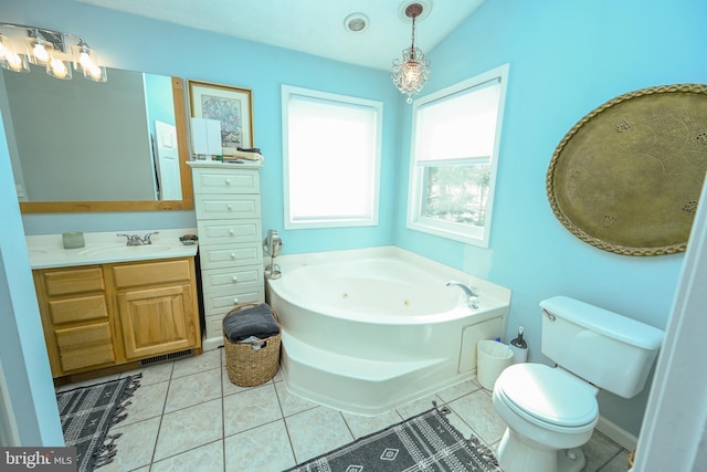 full bathroom featuring toilet, tile patterned floors, vaulted ceiling, vanity, and a bath