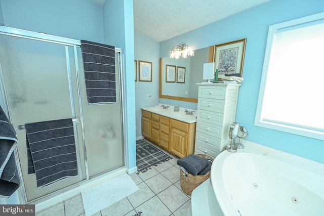 full bath featuring a sink, tile patterned floors, double vanity, a tub with jets, and a stall shower