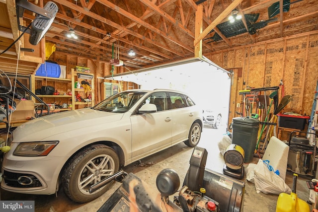 garage featuring a garage door opener