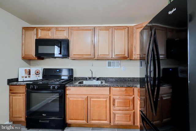 kitchen with a sink and black appliances