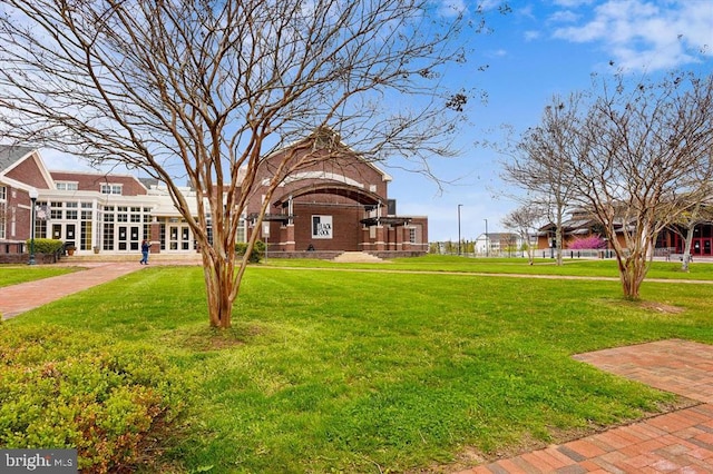 view of community with a lawn