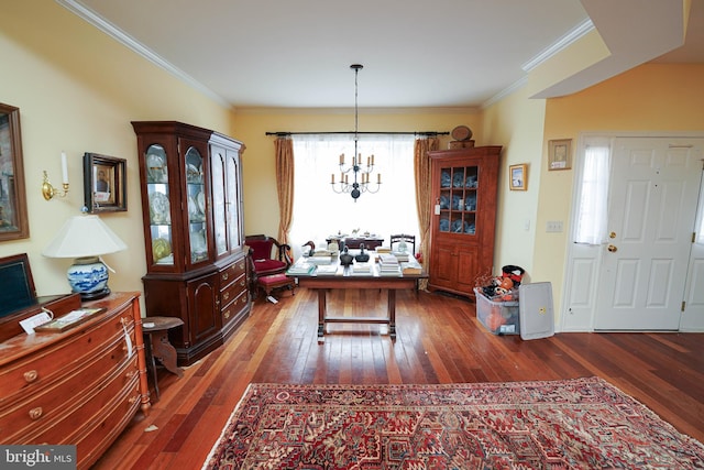 office with crown molding, a chandelier, and dark wood-style flooring