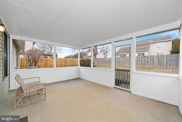 unfurnished sunroom featuring visible vents