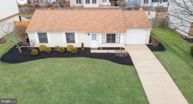 view of front of home featuring a garage, driveway, a shingled roof, and fence