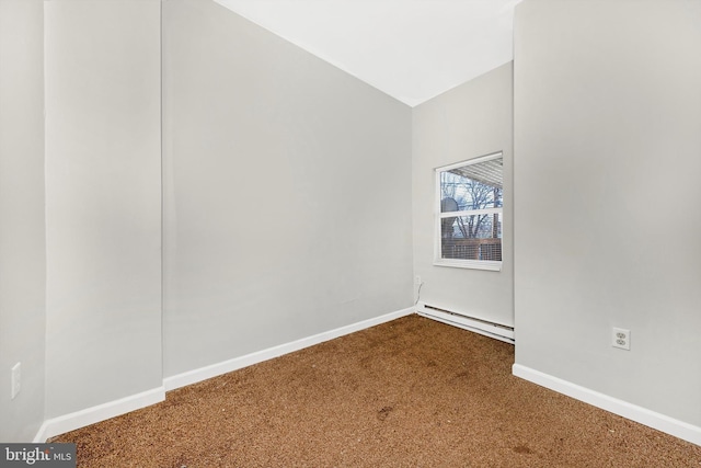 carpeted spare room with lofted ceiling, baseboards, and baseboard heating